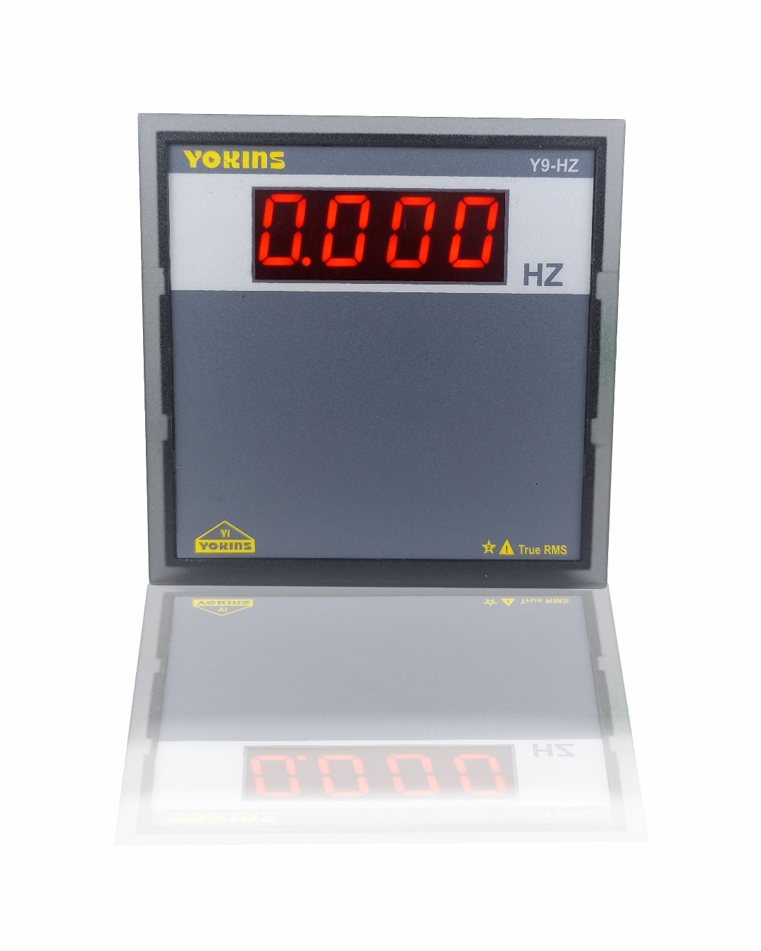Yokins Instruments AC frequency meter displaying digital readout of Hz on a compact handheld device