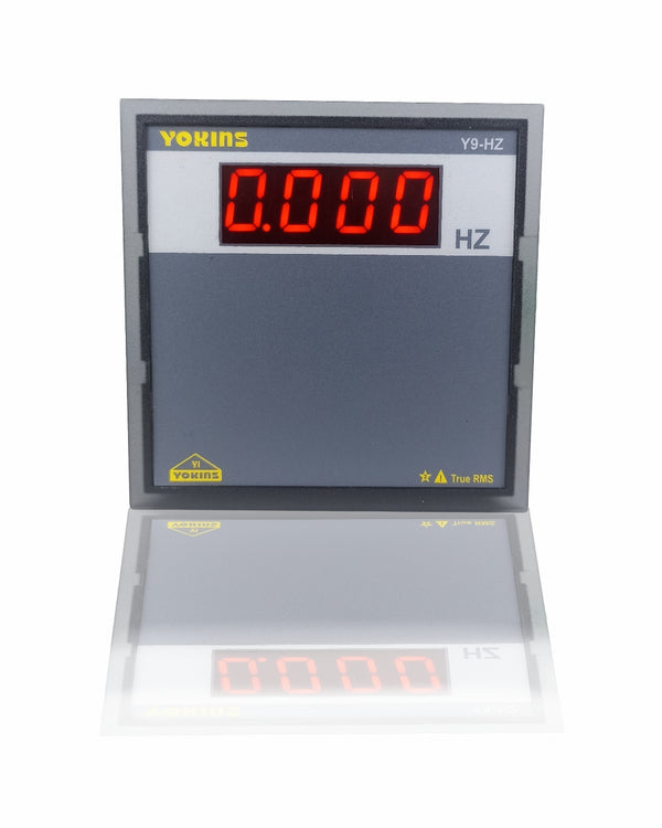 Yokins Instruments AC frequency meter displaying digital readout of Hz on a compact handheld device