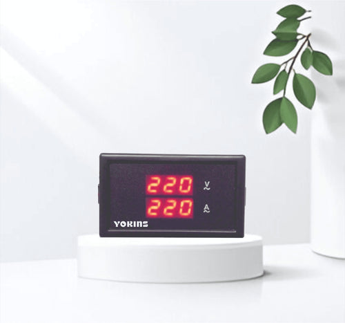 Digital display AC voltmeter and ammeter from Yokins Instruments showing voltage and current readings on a clear screen.