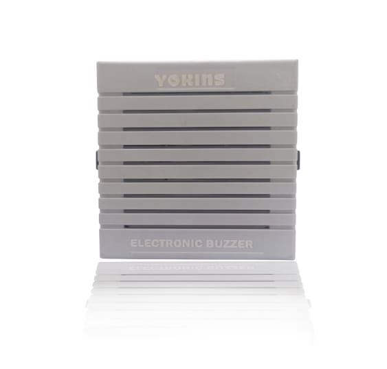 Yokins Instruments electronic buzzer hooter, 72x72mm, with a round metal casing and electrical connection terminals visible.